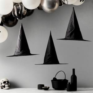 Image of hanging halloween witch hat decorations.