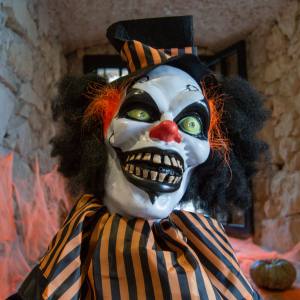 Close up image of an animated Clown decoration.