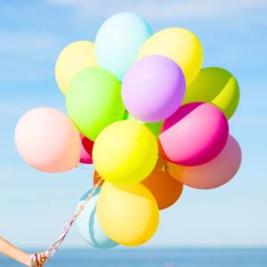 Image of a neon coloured balloon bouquet.